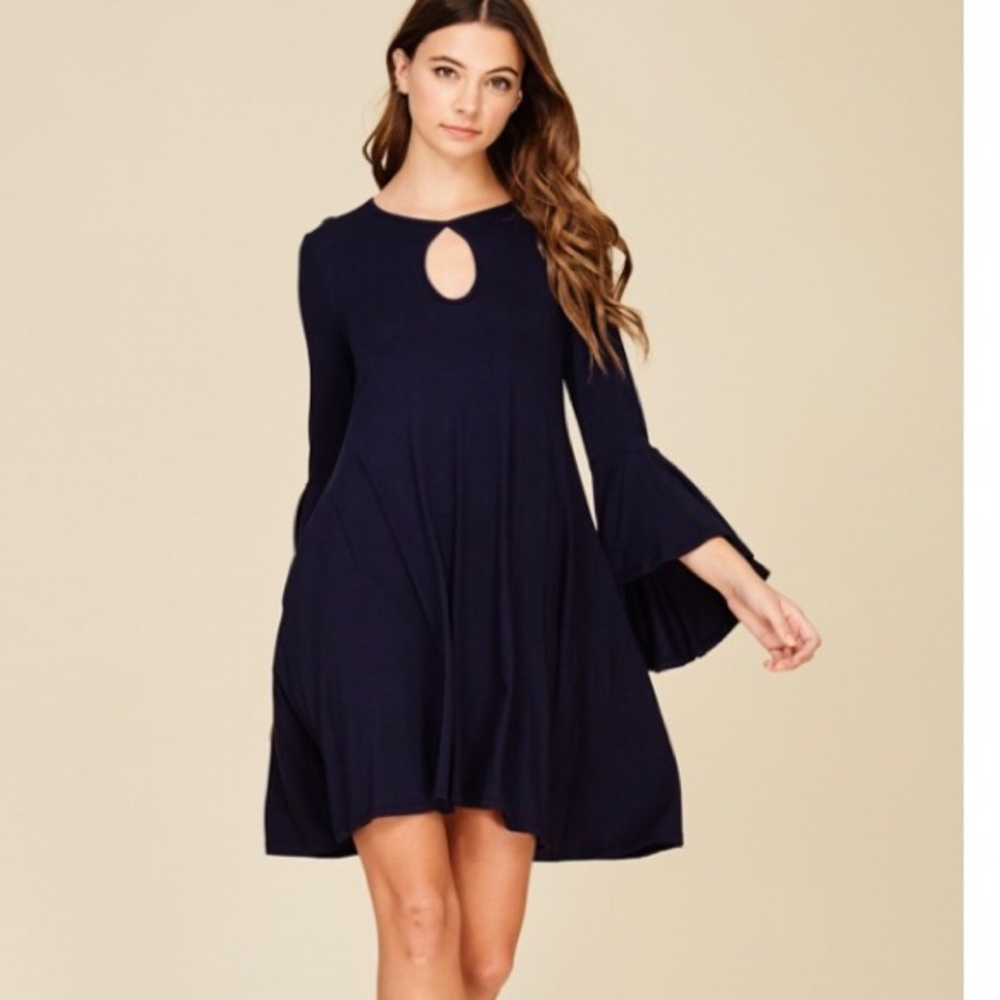 Knit dress featuring round neck, bell sleeve